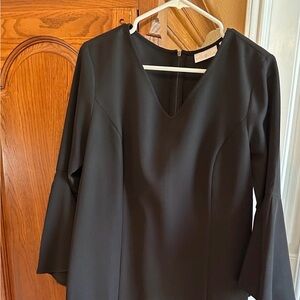 Belle by Kim Gravel 
Black Top with Subtle Elegance
